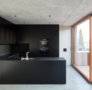 küche neubau wohnhaus beton holz schwarz modern rombach kellenberger ag schreinerei